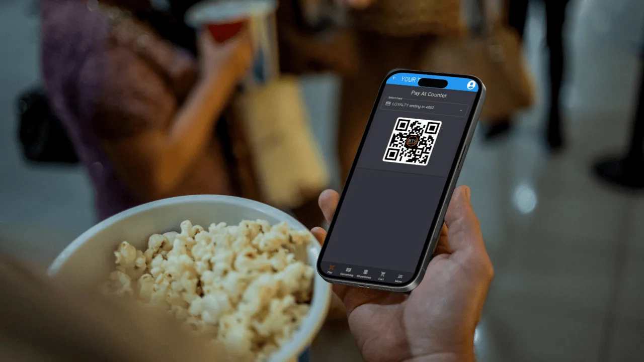 A guest's RTS loyalty QR code on a phone